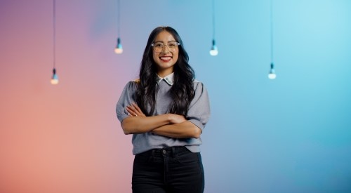 woman smiling lightbulbs